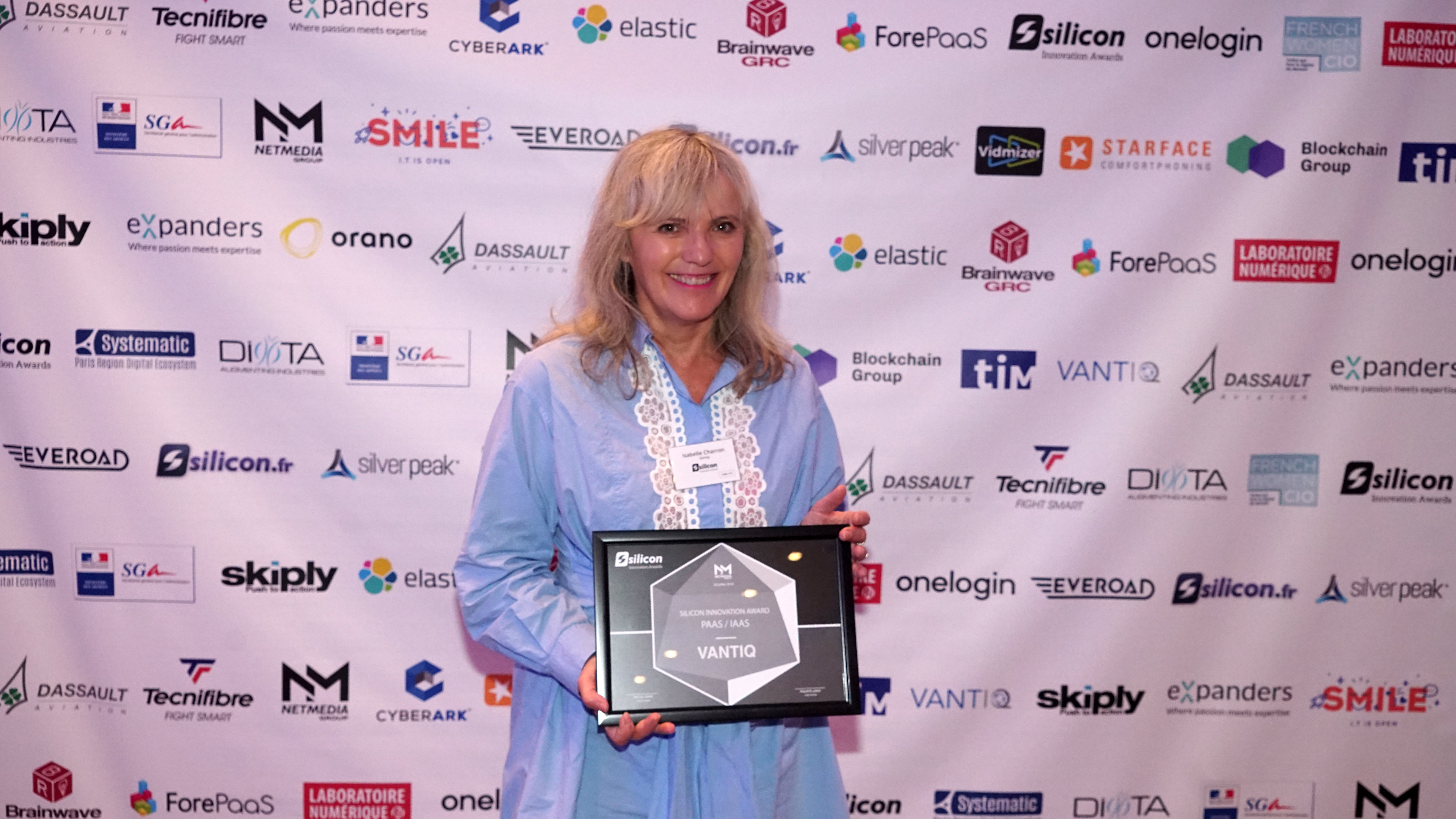 Isabelle Charron-Goupil of VANTIQ posing with award