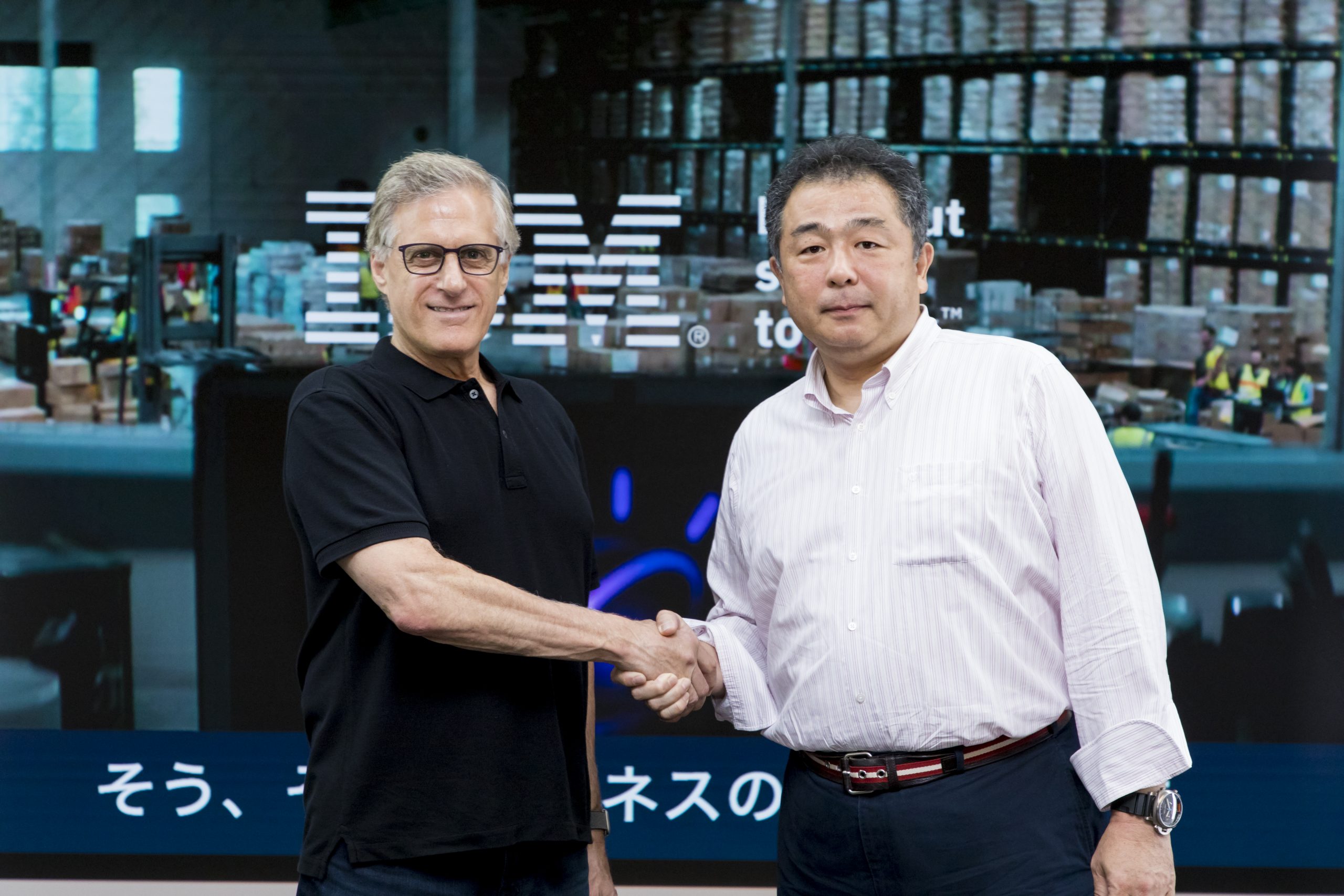 Marty and Tamba-san shaking hands at SoftBank World 