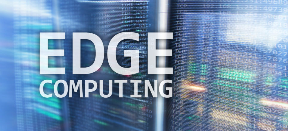 A picture showing edge computing words with code in the background