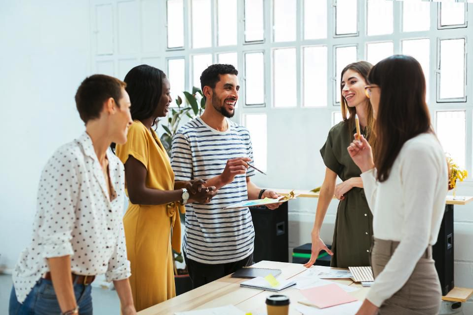 people brainstorming ideas around a table