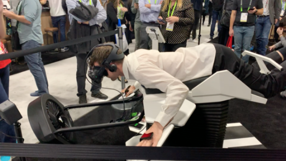 people trying bird flight simulator at CES event 2019 in Las Vegas