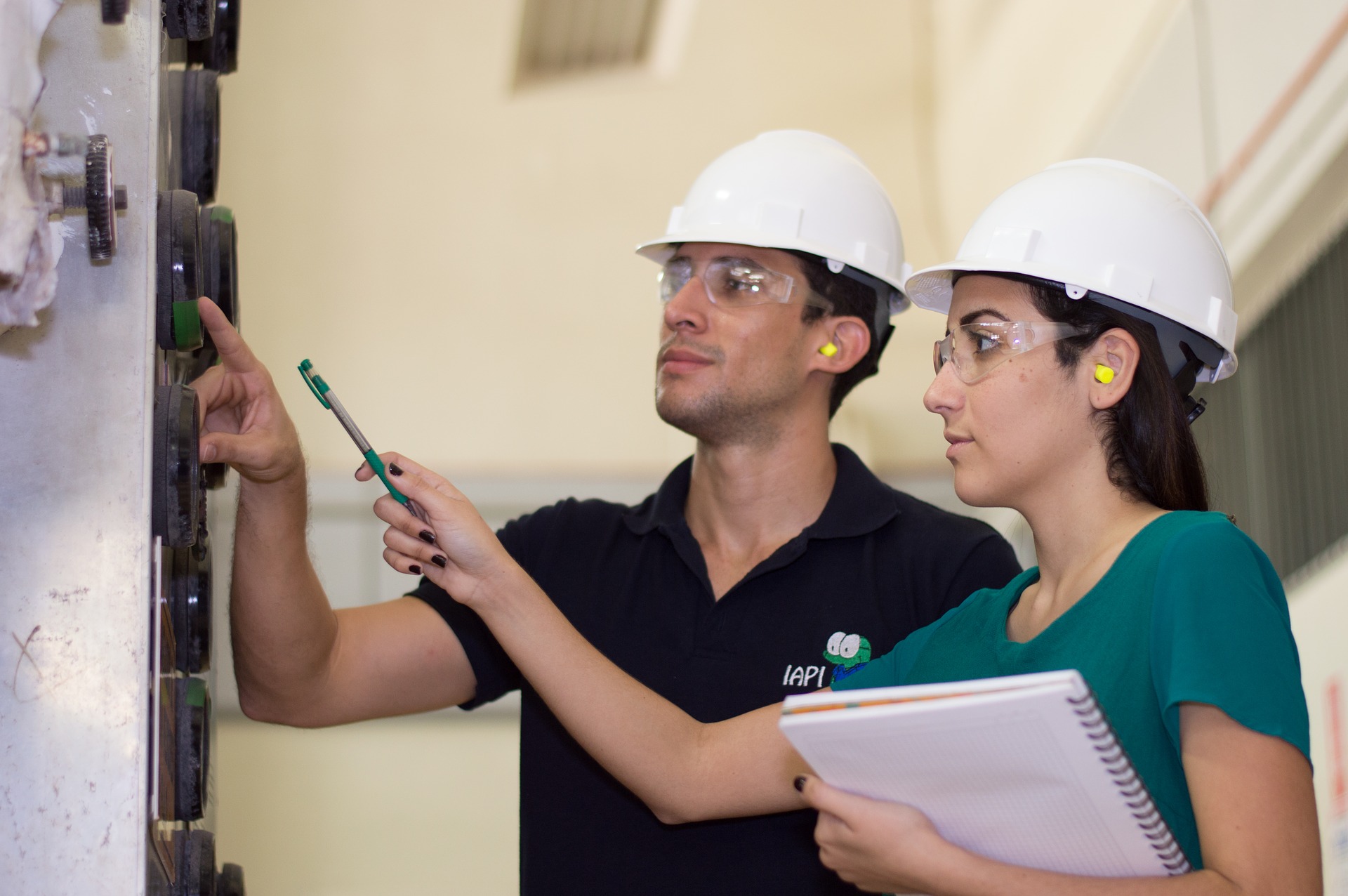 field service engineers checking gauges 