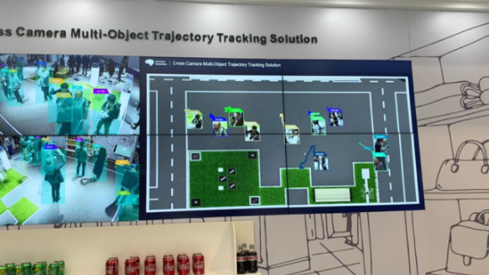 horizon robotics booth showing how they use multi-camera identification and tracking of both known or unknown individuals with their location shown on a real-time map of space at CES 2019