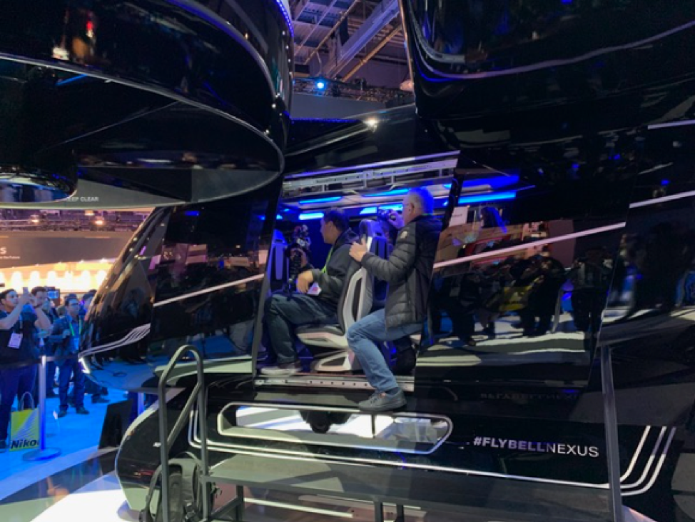 people riding the AR/VR Google assistant amusement park at CES 2019 in Las Vegas