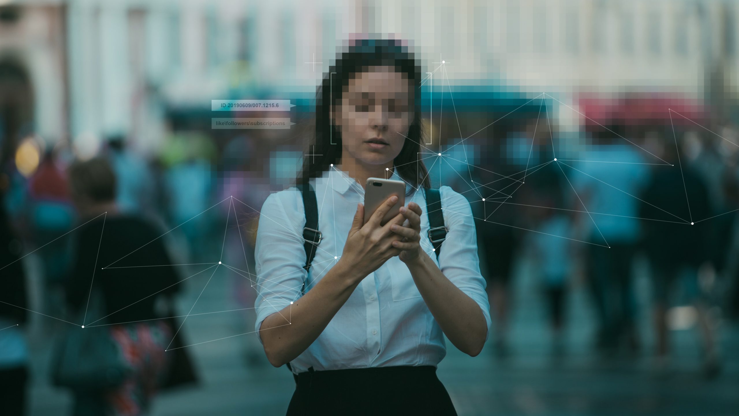 woman with blurred face holding phone